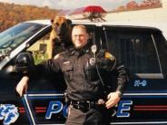 Officer Burgess with K9 Aron, 2001