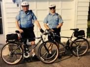 Sgt. Rogers and Officer Marcoccia with their bicycles, 1994